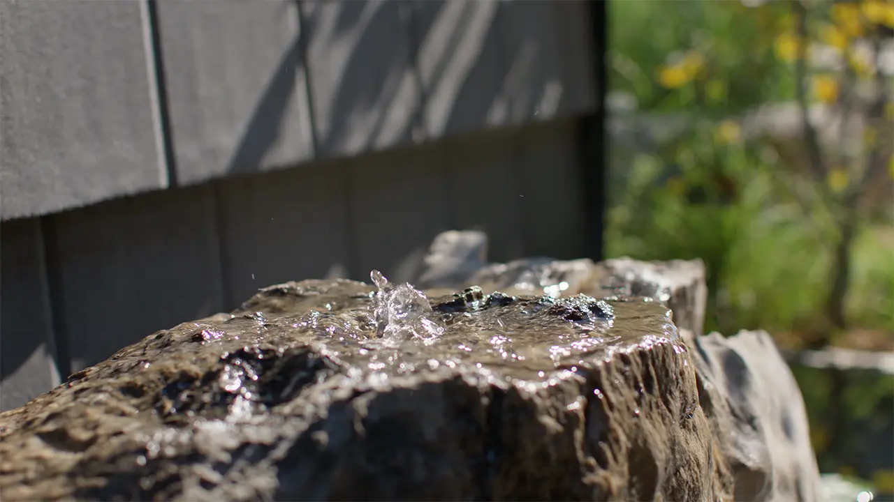 Frame SoCo fountain rock detail